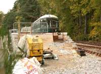 Ongoing construction work at Milton of Crathes on the Royal Deeside Railway in November 2006. View looking west towards Banchory with the preserved battery EMU alongside the platform.<br><br>[John Furnevel 05/11/2006]