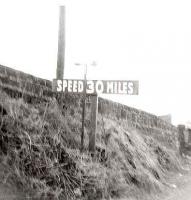 Speed restriction sign on the approach to Cartsburn Viaduct from Kilmacolm, pictured in 1967.<br><br>[John Gray //1967]