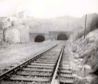 The end of the line from Princes Pier in 1967. The tunnel on the right is to Kilmacolm. The line was eventually skewed to the left and joined to the Wemyss Bay line on the other side of the tunnel. Cartsburn Junction signal box was at the left of the picture.<br><br>[John Gray //1967]