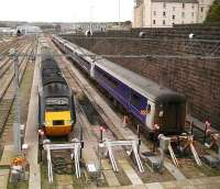 Mid morning scene at Clayhills sidings on Sunday 5 November 2006. The HST set will form the 1142 service to Kings Cross. Stabled alongside is the stock of the Aberdeen portion of the Caledonian Sleeper.<br><br>[John Furnevel 05/11/2006]