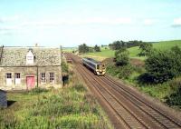 A southbound 158 passes the remains of Greenloaning station in August 1994.<br><br>[John McIntyre 12/08/1994]