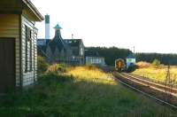 An afternoon Inverness - Aberdeen 158 service passing between Kennethmont signal box and Ardmore distillery in November 2006 on the approach to the former Kennethmont station, closed to passengers in May 1968.<br><br>[John Furnevel 08/11/2006]