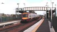 New Strathclyde livery 170 Calls at Camelon eastbound.<br><br>[Brian Forbes /09/2006]