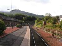 What a backdrop... Crianlarich looking South. Old locomotive shed on the left.<br><br>[Paul D Kerr 04/09/2006]