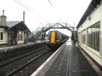 View east at Drem station on 16 August 2011 with a North Berwick - Edinburgh service at the platform.<br><br>[John Yellowlees 16/08/2011]