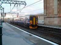 156448 departing with a service to Paisley Canal.<br><br>[Graham Morgan 05/12/2006]