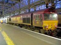 66050 collecting the empty Caledonian Sleeper stock at Glasgow Central<br><br>[Graham Morgan 09/12/2006]