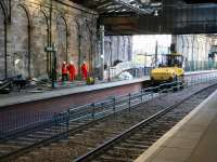 Members of the construction team enter the Balmoral platform off the ramp from Calton Road yard on 15 December 2006. Note the gap in the new platform which provided track level access for plant and equipment has now been closed up. [See image 10831]<br><br>[John Furnevel 15/12/2006]