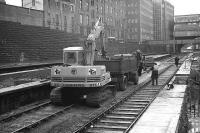 Aberdeen 1973. Looking north along platform 6 over the 4 through platforms (although the platform 7 line on which the digger is standing was truncated at the north end at that particular time).<br><br>[John McIntyre /09/1973]
