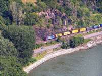 Northbound freight container train on the east bank of the Rhine. This line is primarily used for freight; express passenger trains use the line on the west bank of the river.<br><br>[Paul D Kerr 19/07/2006]