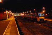 Modern traction at Ilkley. The two platforms to the right no longer go through.<br><br>[Ewan Crawford 14/11/2006]
