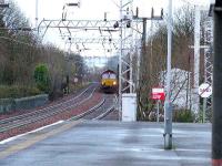 Looking towards Elderslie a Class 66 approached Pailsey Gilmour Street carrying coal bound for Longannet PS<br><br>[Graham Morgan 05/01/2007]