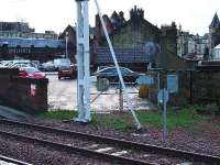 At one time there was a goods yard at Paisley Gilmour Street, which was situated at the same place as the car park and former Post Office. This shows the former entrance to it, which is now a track access point.<br><br>[Graham Morgan 05/01/2007]