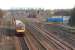 Looking east over Cadder Yard on 1 December 2006 as a Glasgow Queen Street - Dunblane service runs through.<br><br>[John Furnevel 01/12/2006]