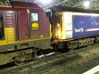 67015 at Glasgow Central coupling up to the empty stock of the Caledonian Sleeper.<br><br>[Graham Morgan 13/01/2007]