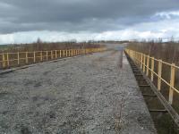 The deck of the viaduct which once carried the Hot Metal Road in Ravenscraig on to the slag processing area.<br><br>[Ewan Crawford 29/03/2004]