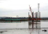 The new bridge at Kincardine taking shape on 23 January with the rig <I>Seacore</I> taking a break. Long lens view from the route into the former power station yard on the north shore of the Forth.<br><br>[John Furnevel 23/01/2007]