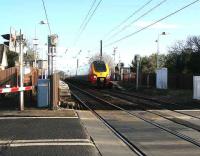 Westbound Voyager through Kingsknowe on 25 January approaching the level crossing.<br><br>[John Furnevel /01/2007]