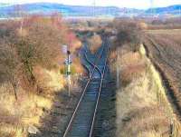 Looking east along the remains of the former Roslin branch at the south west corner of Millerhill yard in January 2007. The route was latterly used by trains serving Bilston Glen Colliery. The last train over the branch ran in 1991 [see image 36126]. <br><br>[John Furnevel 19/01/2007]