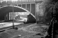 Aberdeen north end, 1975. A class 47 sits under Union Street bridge with the old north box behind and the lines into the former north end platforms lifted. The filled in turntable pit can be seen in the right foreground.<br><br>[John McIntyre /04/1975]