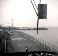 The first year of the <i>blue trains</i>. Approaching Wemyss Bay with one of the ABC car ferries at the pier. The trackbed on the right was the goods line.<br><br>[John Gray /09/1967]