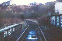 The former Princes Pier line via Kilmacolm used the tunnel on the right. The track was later relaid as seen to connect with the Greenock Container Terminal (Princes Pier) via the Wemyss Bay branch. A signal box stood to the left.<br><br>[John Gray //]