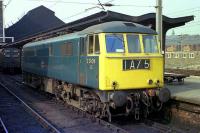 Class 86 E3108 sits in platform 4C at Preston on 27 March 1974. The loco has just been taken off a London to Carlisle service and replaced by a diesel prior to through electric haulage being introduced.<br><br>[John McIntyre 27/03/1974]