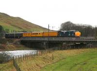 DRS 37611 brings up the rear of a Departmental measurement train heading south over the Clyde at Lamington on 31 January.<br><br>[John Furnevel 31/01/2007]