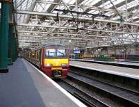 Class 320 at Glasgow Central. These units are rare at this location.<br><br>[John Yellowlees 28/01/2007]