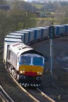 Stobart Rail 66411 <I>Eddie the Engine</I> approaching Greenhill Lower Jct on 6 February with the Daventry - Grangemouth <i>Tesco</I> containers.<br><br>[Bill Roberton 6/02/2007]