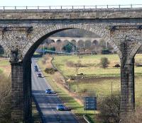 Viaduct through a viaduct. Shortly after leaving the main line south of Markinch station, the Leslie branch crossed the Leven on a substantial viaduct, seen here in the centre background on 6 February 2007, looking west through one of the arches of Markinch Viaduct.<br><br>[John Furnevel 06/02/2007]