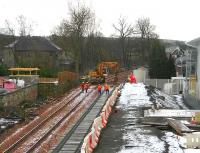 Finishing off sleeper laying at Alloa on 8 February at what will be the location of the buffer stops.<br><br>[John Furnevel 08/02/2007]