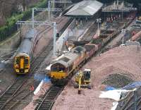 A PW train with a class 66 locomotive at each end pulls away from platform 17 on 9 February 2007, just as a westbound service leaves platform 20.<br><br>[John Furnevel 09/02/2007]