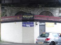 Confectioner and newsagent under Bridge 12, Cumberland Street, Glasgow. Not the orginal building... I wonder what the 2 arches where used for?<br><br>[Colin Harkins 10/02/2007]