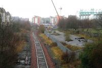 The remains of Lochend South Junction in March 2007. The surviving line runs to Powderhall refuse depot. Left at the end of the fence was the Abbeyhill loop and to the right the line to Leith Central via Lochend North Junction and Easter Road Halt (alongside the football stadium).<br><br>[John Furnevel 19/03/2007]