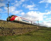 Pendolino climbing Shap on 18 February passing Scout Green on the northbound ascent.<br><br>[John McIntyre 18/02/2007]