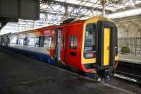 South West Trains liveried 158 forming the 1403 service to Dunblane stands at Waverley platform 13 on 3 March.<br><br>[John Furnevel 03/03/2007]