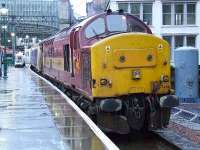 37406 Saltire Society at Glasgow Central in the rain collecting the empty stock of the Caledonian Sleeper.<br><br>[Graham Morgan 22/02/2007]