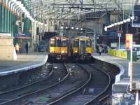A Class 314 & a Class 318 at Platform 12 & 13.<br><br>[Graham Morgan 19/03/2007]