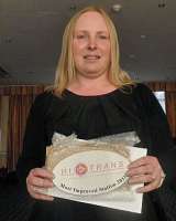 Mandi Dees with the award she collected on behalf of her late father Brian Bentham - see News Item.<br>
<br><br>[ScotRail 30/03/2012]