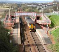 Sunshine on Baillieston, as a Glasgow Central - Whifflet service pulls into the station, April 2007.<br><br>[John Furnevel 23/04/2007]