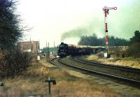 A southbound car train approaches the closed station of Hemsen between Emden and Rheine in April 1976.<br><br>[John McIntyre /04/1976]
