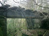West Highland Line, remains of bridge on Faslane siding.<br><br>[Alistair MacKenzie 17/04/2007]