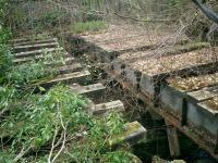 West Highland Line, remains of bridge on Faslane siding.<br><br>[Alistair MacKenzie 17/04/2007]