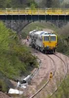 Ballast tamping in operation west of Kincardine on 25 April. <br><br>[Bill Roberton 25/04/2007]