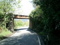 <h4><a href='/locations/W/Whistlefield'>Whistlefield</a></h4><p><small><a href='/companies/W/West_Highland_Railway'>West Highland Railway</a></small></p><p>Whistlefield - West Highland Line bridge over the A814 Loch Long road. 45/63</p><p>30/04/2007<br><small><a href='/contributors/Alistair_MacKenzie'>Alistair MacKenzie</a></small></p>