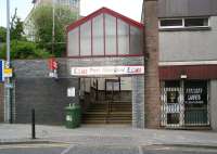 Entrance to Port Glasgow station from the junction of Princes Street and Station Road in April 2007. The ramp up to the eastbound platform and footbridge is to the right at the top of the steps. [See image 54919]<br><br>[John Furnevel 29/04/2007]