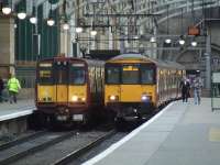 314210 and 318251 at Platform 12 & 13<br><br>[Graham Morgan 20/04/2007]