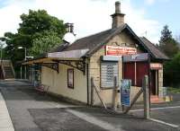 <I>What's this... a new ScotRail long-distance service?</I> The converted station building on the southbound platform at Busby in May 2007, now in use as a Chinese takeaway.<br><br>[John Furnevel 06/05/2007]