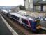 Aberdeen train standing under the newly installed footbridge at Markinch on 13 March 2007 as work continues in the background on the new interchange.  <br><br>[John Furnevel 13/03/2007]